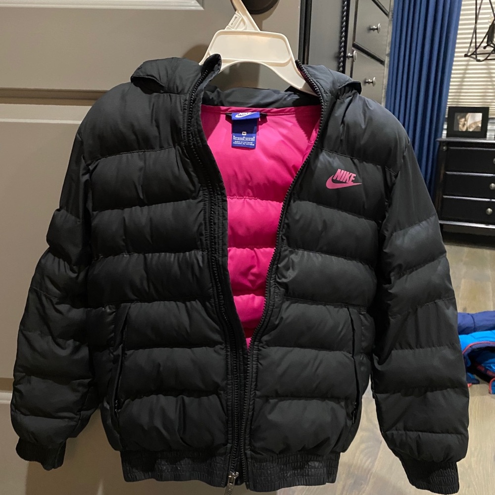 Nike pink lined puffer jacket.  Unisex